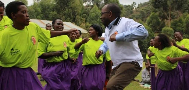 Africa Regional Director Julius Arinaitwe dances while supporting women's empowerment during a monitoring visit to one of the projects in Uganda. Photo: BirdLife International. Africa Regional Director Julius Arinaitwe dances while supporting women's empowerment during a monitoring visit to one of the projects in Uganda. Photo: BirdLife International.