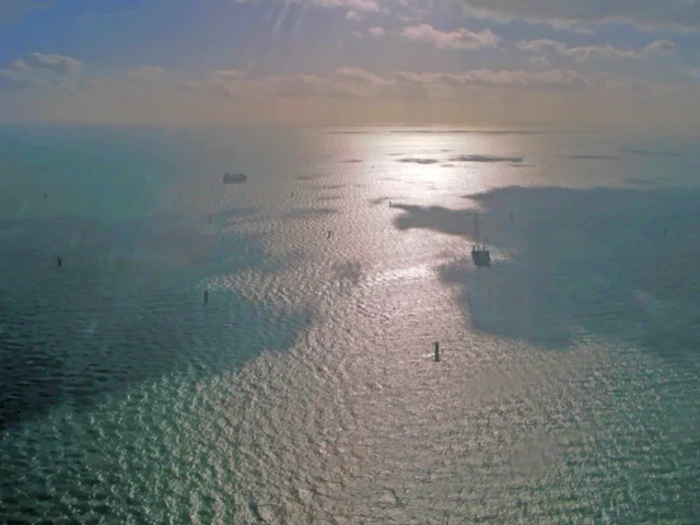 London Array wind turbines under construction in the North Sea just east of Kent, taken from a light aircraft. Photo: William Hall (commons.wikimedia.org). London Array wind turbines under construction in the North Sea just east of Kent, taken from a light aircraft. Photo: William Hall (commons.wikimedia.org).