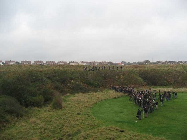Birders watching the Eastern Crowned Warbler in Trow Quarry. Birders watching the Eastern Crowned Warbler in Trow Quarry.