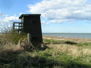 The double-decker hide, with Fenham Flats beyond (and The Snook on the horizon). The double-decker hide, with Fenham Flats beyond (and The Snook on the horizon).