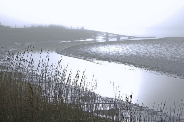 The River Wampool at Anthorn on a misty December morning. The River Wampool at Anthorn on a misty December morning.