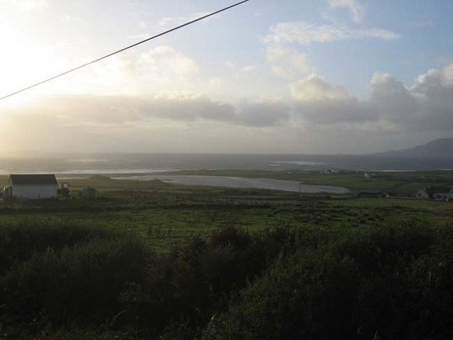 Cross Lough during the evening, with Clare Island looming in the background. Cross Lough during the evening, with Clare Island looming in the background.