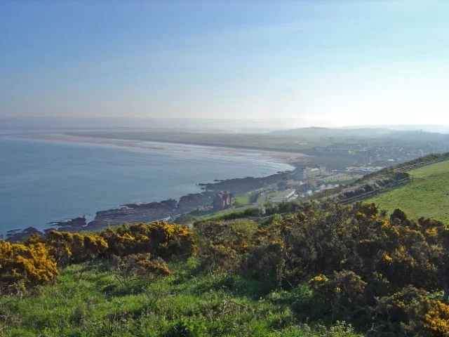 Westward Ho with Northam Burrows in the background and the Taw/Torridge Estuary beyond that. Westward Ho with Northam Burrows in the background and the Taw/Torridge Estuary beyond that.