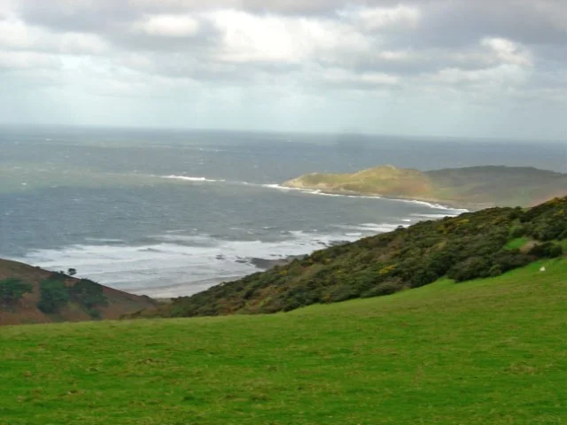 Woolacombe Bay with Morte Point in background. Woolacombe Bay with Morte Point in background.