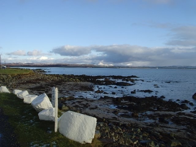 Looking southeast from Bruichladdich across Loch Indaal. Looking southeast from Bruichladdich across Loch Indaal.