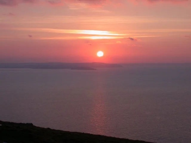 Evening view from the Great Orme looking across to Puffin Island and southeastern Anglesey. Evening view from the Great Orme looking across to Puffin Island and southeastern Anglesey.