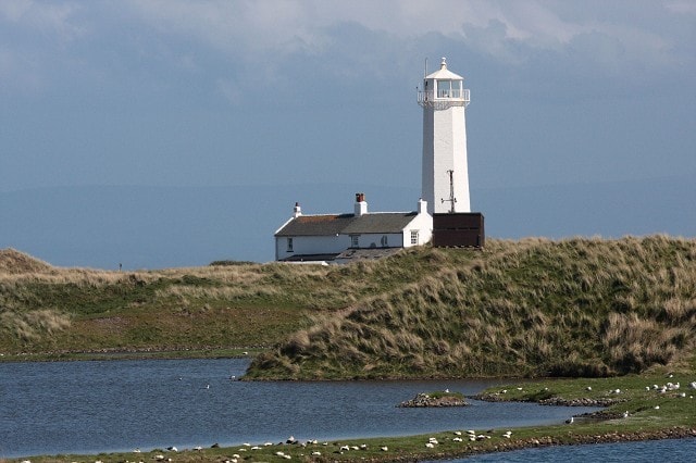 This photo was taken over one of a number of gravel pools towards the Bay Hide and the lighthouse. This photo was taken over one of a number of gravel pools towards the Bay Hide and the lighthouse.